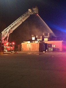 The Pella Fire Department sprays the roof of the Coffee Cup Cafe... 			
			</div>
				<a href=