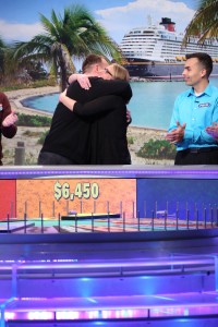 Jer and Melanie celebrate their success in a "Wheel of Fortune" round.