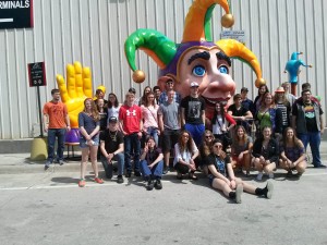  30 L-S music, band, speech, and drama students in front of Blaine Kerr’s Mardi Gras World, a facility where Mardi Gras floats are created.