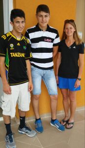 Luke (left) and Julie (right) with their World Vision sponsored child, Andrei.