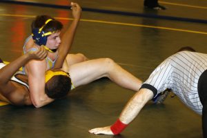 Junior Sage Zylstra pins Iowa Falls’ Montana Marchant at the Saydel Tournament on Saturday. Zylstra placed fifth in the 160-pound weight division.