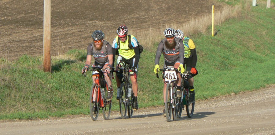 Bikers trekking across Iowa on gravel roads ride near Sully