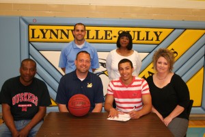 Shown from left are, front row: His father, TC Cunningham of Lynnville; John Henry, William Penn University Head Basketball Coach; TJ Cunningham; his mother, Amy Cunningham of Lynnville; back row: L-S Head Basketball Coach Nick Harthoorn; and TJ’s grandmother, Shirley Cunningham of Eastaboga, AL. 