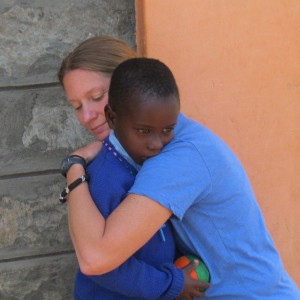 Julie Jones embraces Micah, the child she hiked... 			
			</div>
				<a href=
