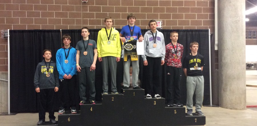 Roland wins 125-pound weight bracket at state