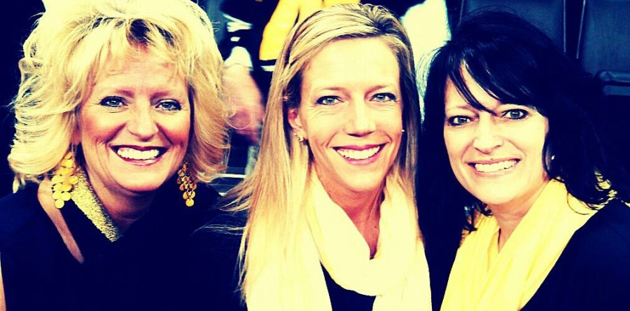 Sisters sing at Hawkeyes basketball game