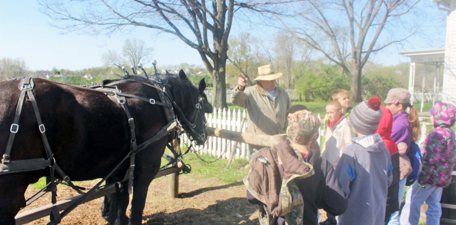 Fourth graders step back in time at Living History Farms