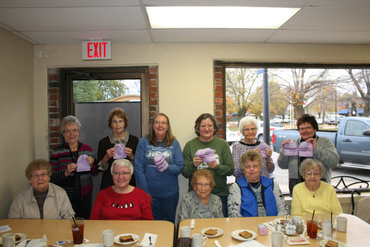 Makers of purple hats for November Shaken Baby Awareness Month