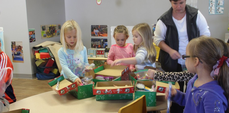 Preschoolers fill boxes of love, generosity