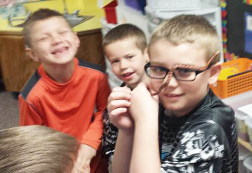 Cody Graham shows off slithery second-grade guest