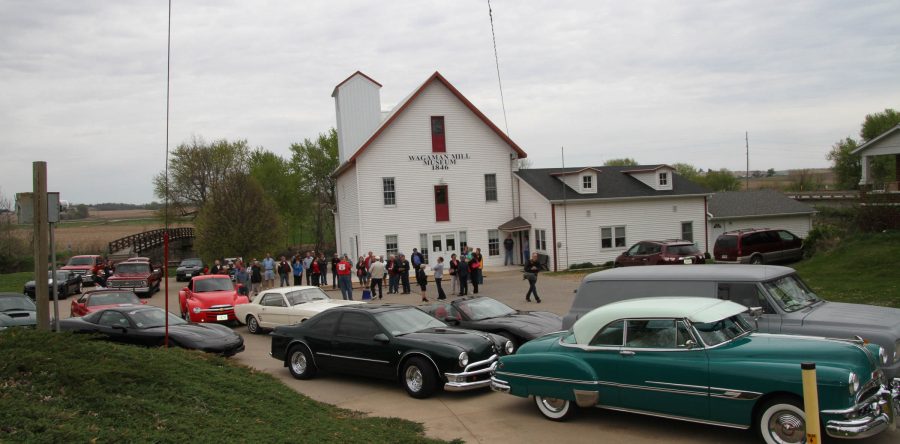 Classic car club tours through area