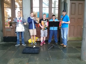 Caleb Jansen, Mr. McNulty, Zach Van Waardhuizen, Dillon Van Manen, and Garret Cross play jazz on the streets of Jackson Square.
