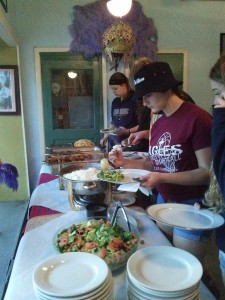 5. Kayla Van Dyke and Alexis Hardenbrook are among students choosing from a diverse buffet at the Golden Feather Mardi Gras Indian restaurant.