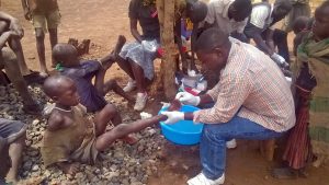 A man removes jiggers from a boy's foot in the Ugandan village of Lia. Jiggers are small insects that burrow into skin (normally under toenails or fingernails), lay eggs, and become incredibly painful. When left untreated, they can start to destroy soft tissue and cause many health issues. Removing jiggers was one of the tasks Sevcik and her team helped with as part of their mission work in Africa. They saw a lot of people who had lost toenails, toes, or had severe infections, among other problems. Unfortunately, the jiggers are very common in some areas, so it has just become a way of life for many, according to Sevcik. 
