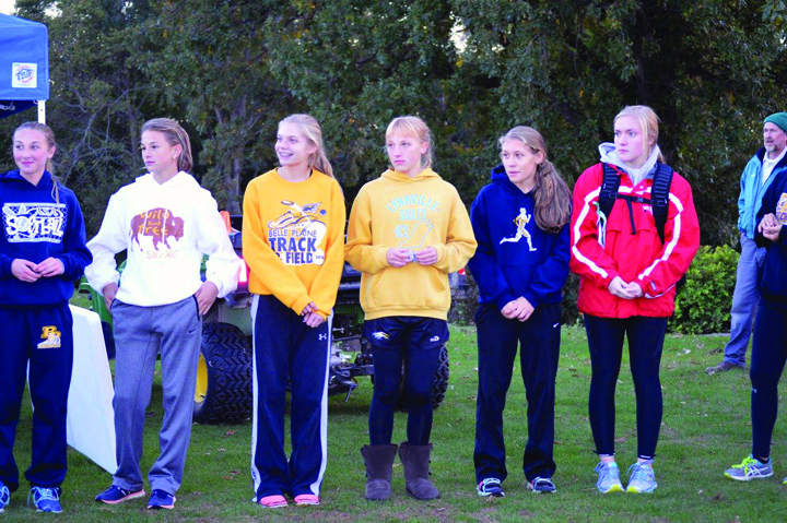 Hawks improve times at conference meet