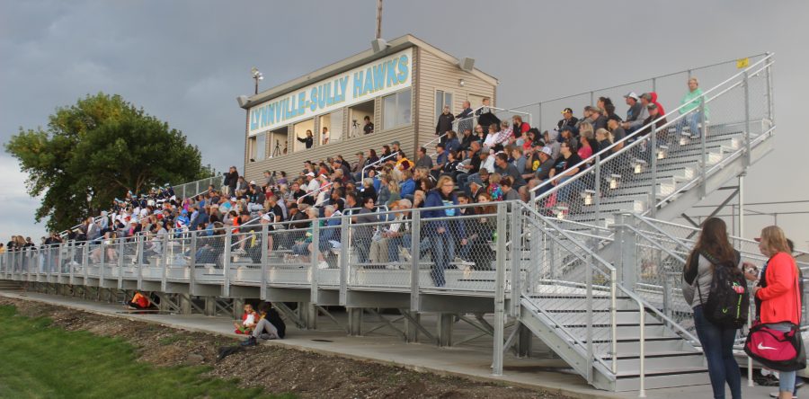 New seating, sound, and soggy conditions greet L-S Hawk fans in game two