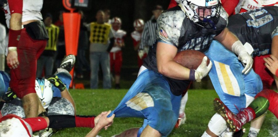 Hawks battle for 32-14 homecoming win