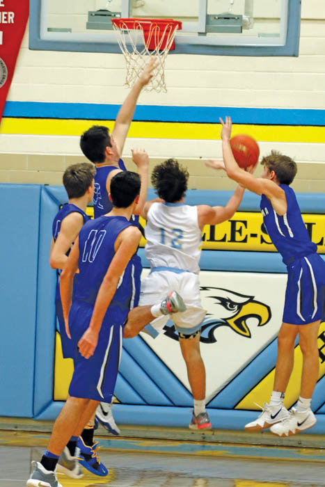 Hawks fall to third-ranked Monte, beat NM in OT
