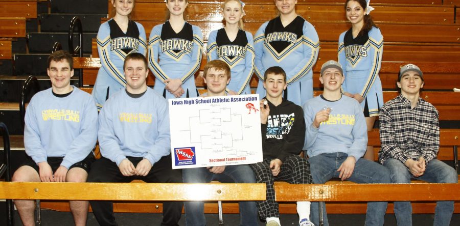 Three Hawks clinch spots at district wrestling tourney