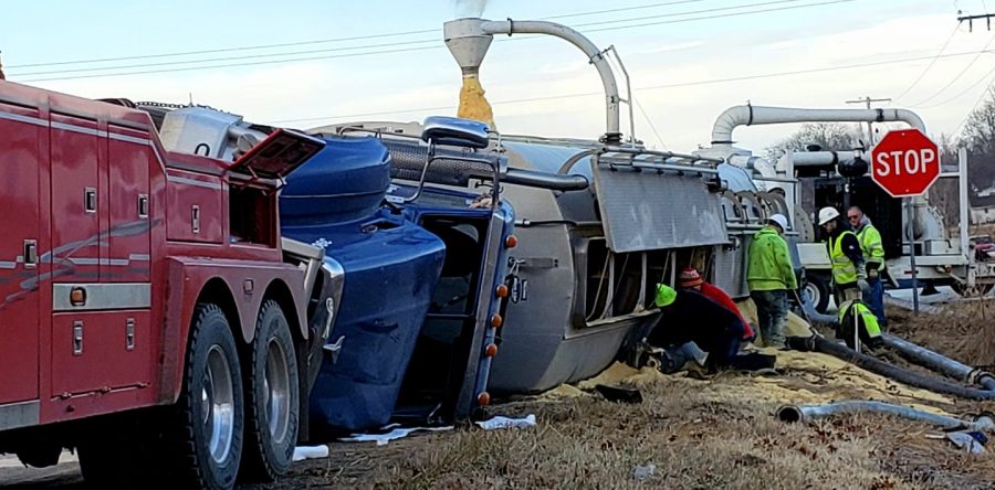Feed truck tips over at intersection in Lynnville