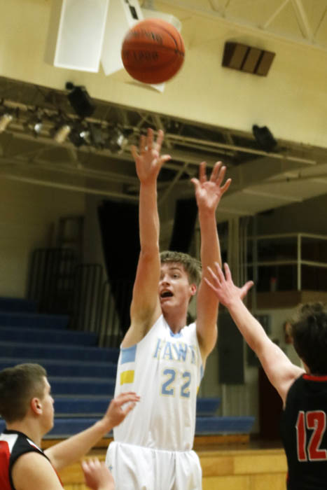 JV boys overcome slow start to beat NM