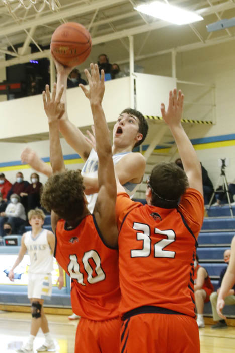Hawks overcome slow start to top Tigerhawks