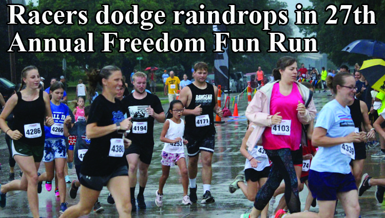Runners dodge raindrops in 27th Annual Freedom Fun Run