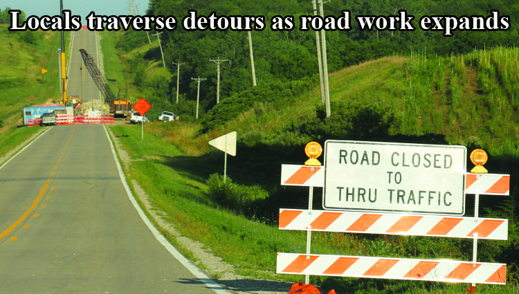 Locals traverse alternate routes as road construction expands