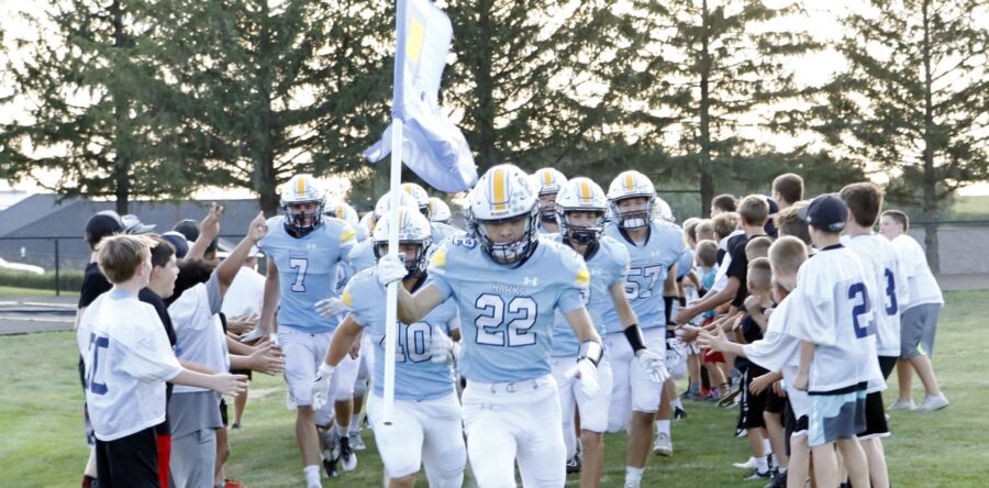 Hawks trounce the Trojans 32-7 in home opener