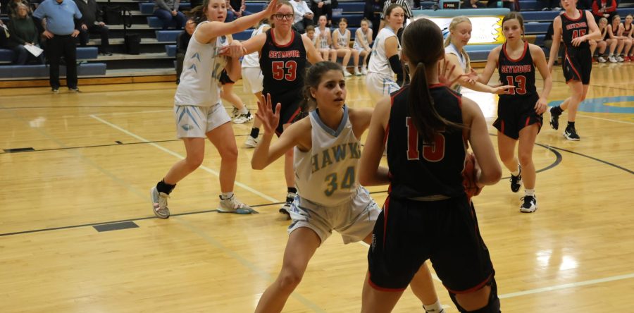 Second-half struggles doom Hawk girls basketball