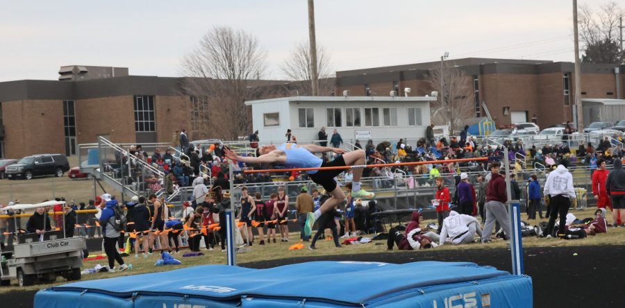 Hawks capture 12 top-three finishes, set meet records in chilly start