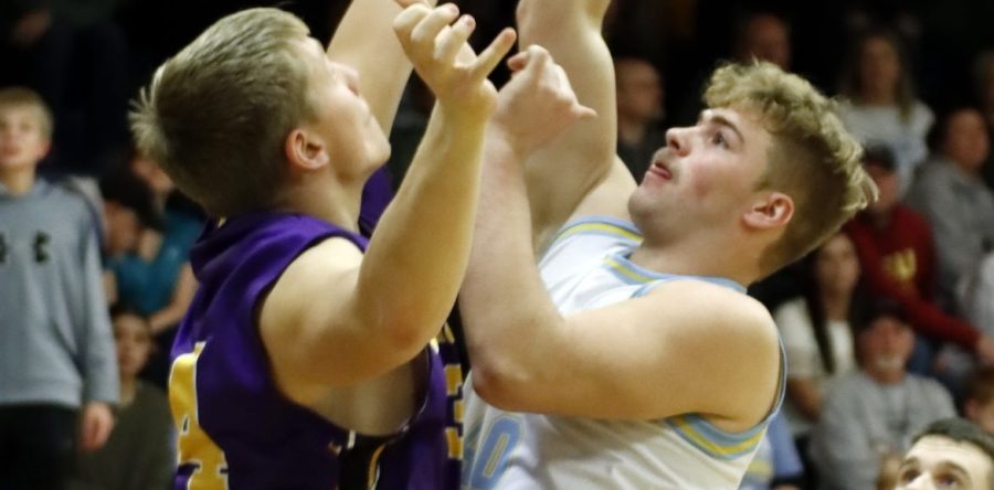 Late rally falls short, Hawks suffer first loss of the season