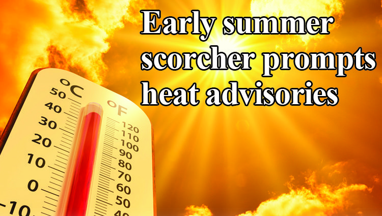 Early summer scorcher prompts heat advisories