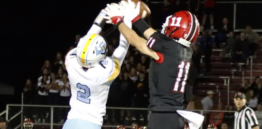 Hawks persevere for the win in battle with the Warhawks