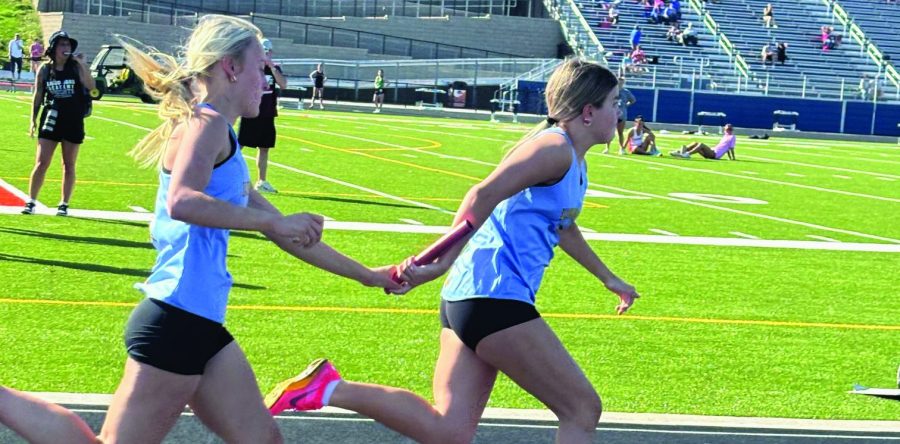 L-S girls blaze around the track at Colfax-Mingo
